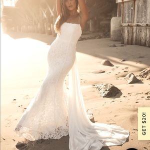 White wedding gown. Used only once and dry cleaned. Good as new